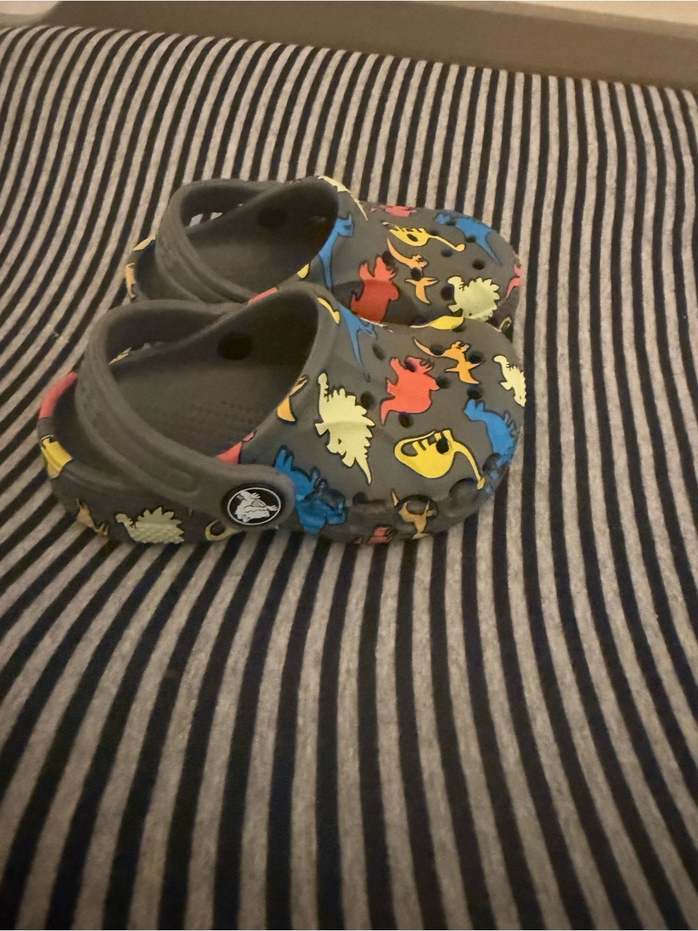 Brand New CROCS Kids Gray Clogs with Red, Blue, Yellow & Cream Dinosaurs